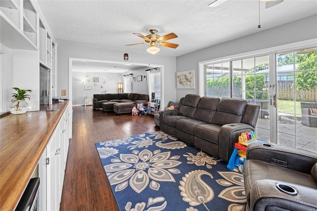 2220 Derbyshire Rd, Maitland, FL 32751 - living room featuring ceiling fan and dark wood finished floors