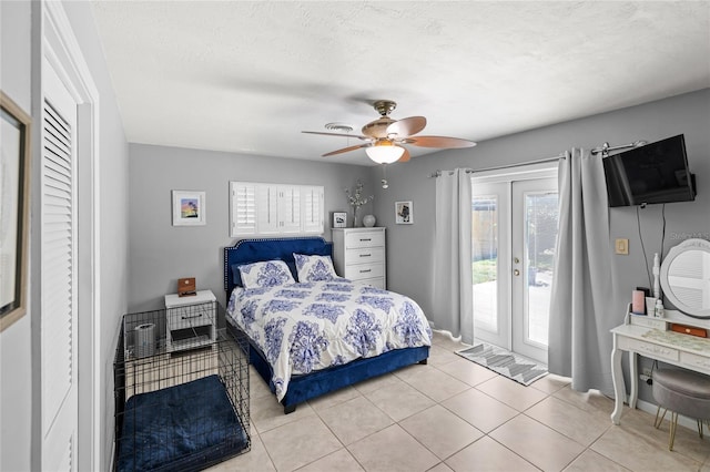 2220 Derbyshire Rd, Maitland, FL 32751 - bedroom featuring access to exterior, multiple windows, french doors, and light tile patterned floors