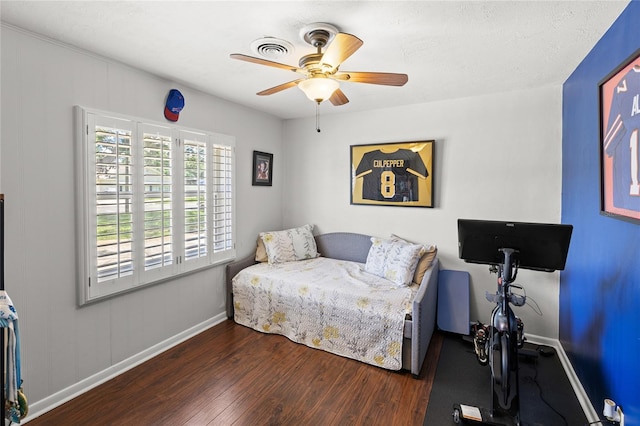 2220 Derbyshire Rd, Maitland, FL 32751 - bedroom with wood finished floors and a ceiling fan