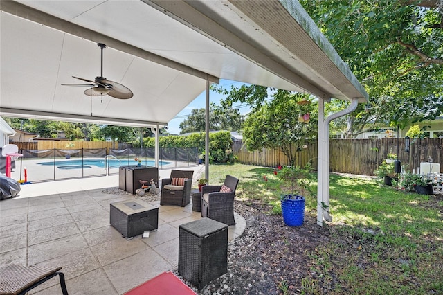2220 Derbyshire Rd, Maitland, FL 32751 - fenced backyard featuring a ceiling fan and a patio