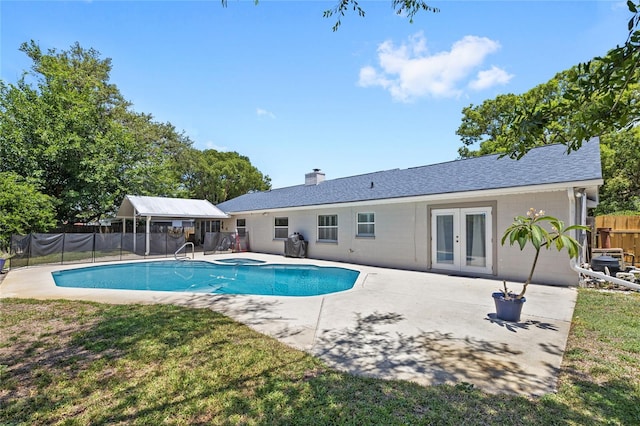 2220 Derbyshire Rd, Maitland, FL 32751 - view of swimming pool with french doors and a patio