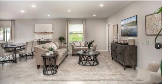 305 Cadence Gln SW, Lake City, FL 32024 - living room with recessed lighting and light tile patterned floors