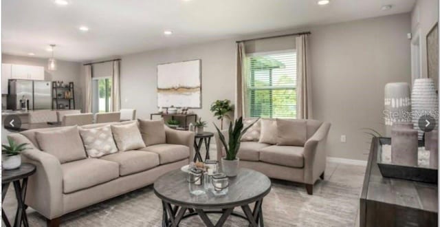 305 Cadence Gln SW, Lake City, FL 32024 - living room featuring recessed lighting