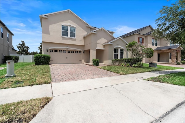 7409 Fairgrove Ave, Windermere, FL 34786 - traditional home with decorative driveway, stucco siding, and a garage