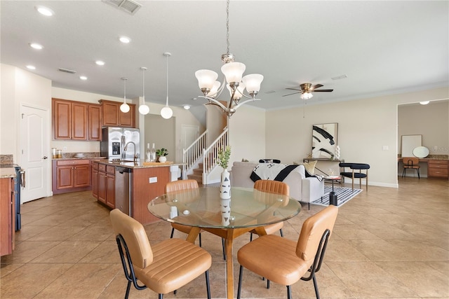 7409 Fairgrove Ave, Windermere, FL 34786 - dining space featuring ceiling fan, recessed lighting, light tile patterned floors, a chandelier, and crown molding