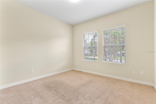 7409 Fairgrove Ave, Windermere, FL 34786 - unfurnished room featuring light carpet