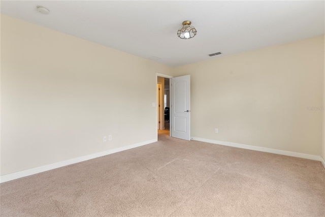 7409 Fairgrove Ave, Windermere, FL 34786 - empty room featuring light colored carpet and a smoke detector