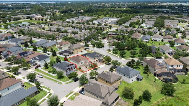 7409 Fairgrove Ave, Windermere, FL 34786 - aerial perspective of suburban area with property parcel outlined and a nearby body of water