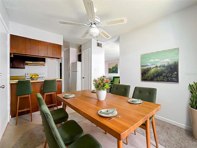 200 St Andrews Blvd Unit 911, Winter Park, FL 32792 - dining room with ceiling fan and a textured ceiling