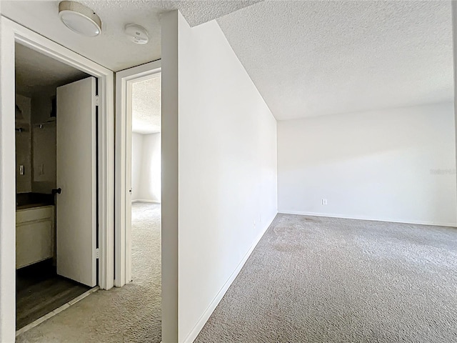 200 St Andrews Blvd Unit 911, Winter Park, FL 32792 - bonus room with a textured ceiling and carpet floors