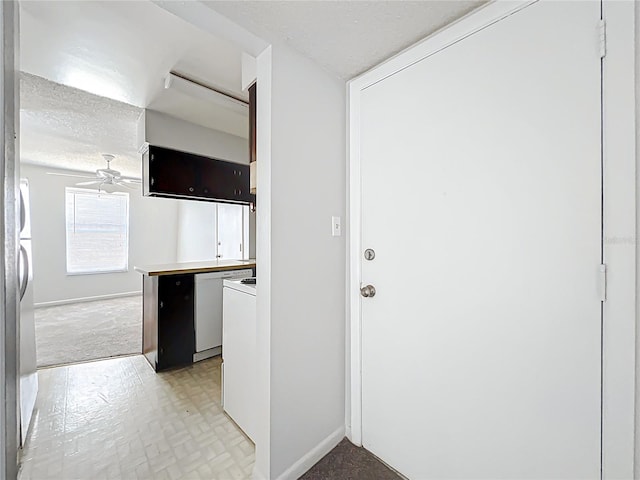 200 St Andrews Blvd Unit 911, Winter Park, FL 32792 - kitchen featuring dishwasher, a textured ceiling, ceiling fan, and light carpet