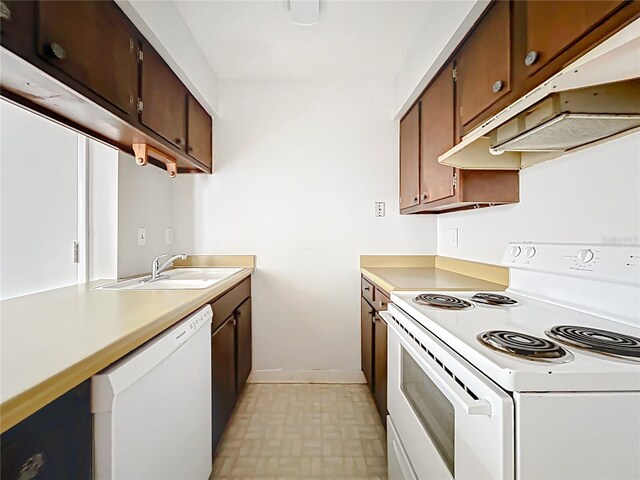 200 St Andrews Blvd Unit 911, Winter Park, FL 32792 - kitchen featuring white appliances, light countertops, and under cabinet range hood