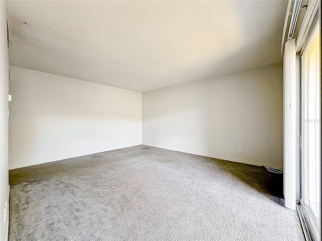 200 St Andrews Blvd Unit 911, Winter Park, FL 32792 - spare room featuring carpet and a textured ceiling