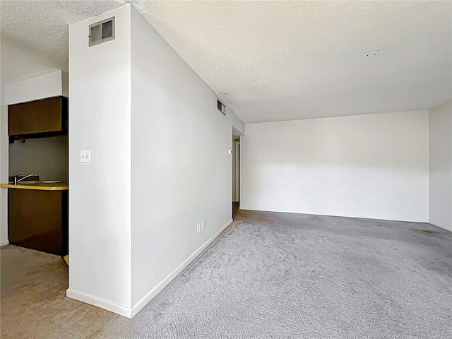 200 St Andrews Blvd Unit 911, Winter Park, FL 32792 - empty room with a textured ceiling and carpet flooring