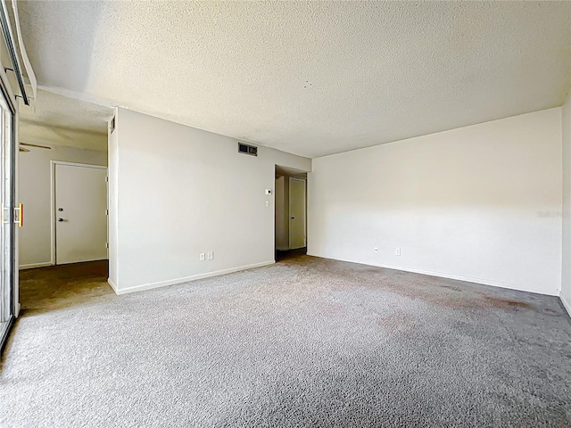 200 St Andrews Blvd Unit 911, Winter Park, FL 32792 - carpeted spare room with a textured ceiling and baseboards