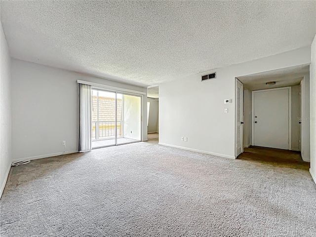 200 St Andrews Blvd Unit 911, Winter Park, FL 32792 - carpeted empty room featuring a textured ceiling and baseboards
