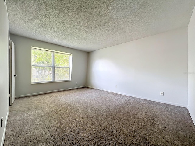 200 St Andrews Blvd Unit 911, Winter Park, FL 32792 - carpeted spare room with a textured ceiling and baseboards