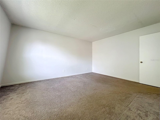 200 St Andrews Blvd Unit 911, Winter Park, FL 32792 - unfurnished room with carpet and a textured ceiling