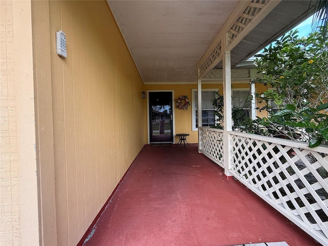 831 Fletcher Rd SE, Palm Bay, FL 32909 - entrance to property with a porch