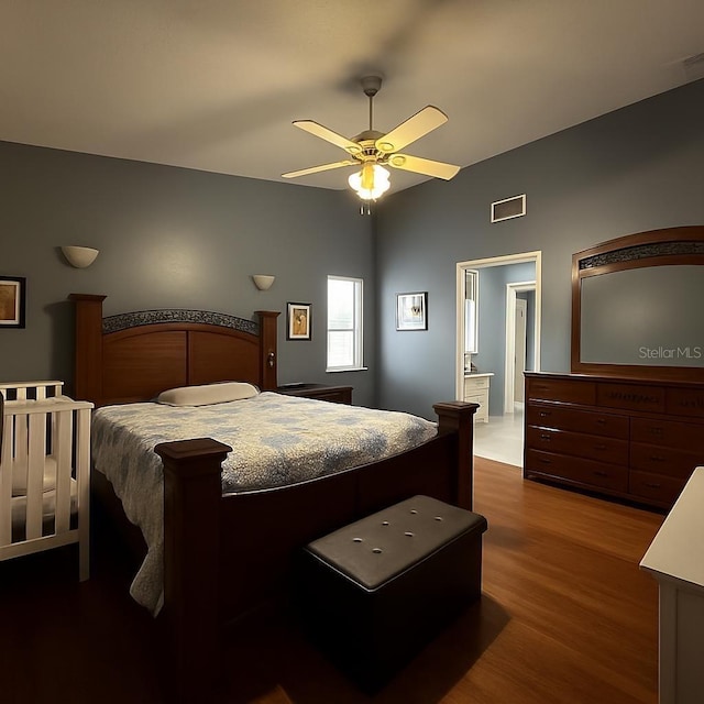 831 Fletcher Rd SE, Palm Bay, FL 32909 - bedroom featuring wood finished floors and a ceiling fan