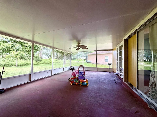 831 Fletcher Rd SE, Palm Bay, FL 32909 - unfurnished sunroom with ceiling fan