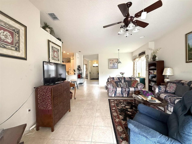 3539 Maple Ridge Loop, Kissimmee, FL 34741 - living area with light tile patterned floors and ceiling fan