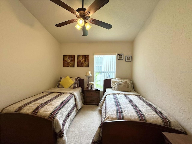 3539 Maple Ridge Loop, Kissimmee, FL 34741 - carpeted bedroom featuring a textured wall, lofted ceiling, and ceiling fan