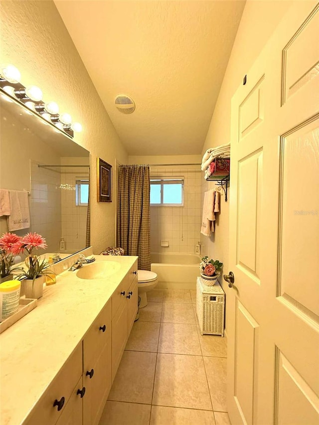 3539 Maple Ridge Loop, Kissimmee, FL 34741 - full bathroom with tile patterned floors, vanity, lofted ceiling, a textured wall, and shower / bathtub combination with curtain
