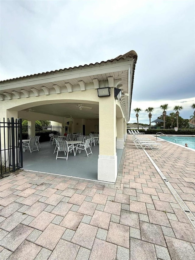3539 Maple Ridge Loop, Kissimmee, FL 34741 - view of patio with a community pool