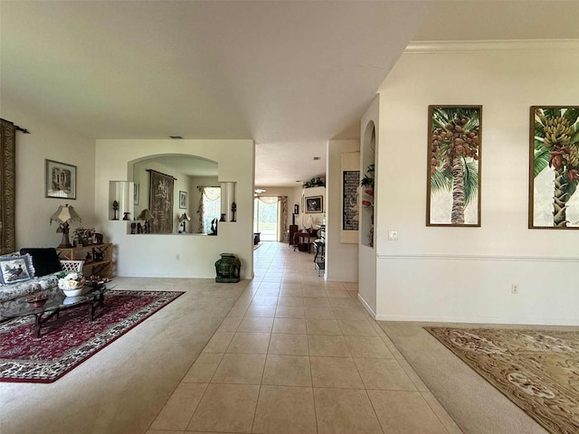 3539 Maple Ridge Loop, Kissimmee, FL 34741 - hall featuring arched walkways, light tile patterned floors, and light carpet
