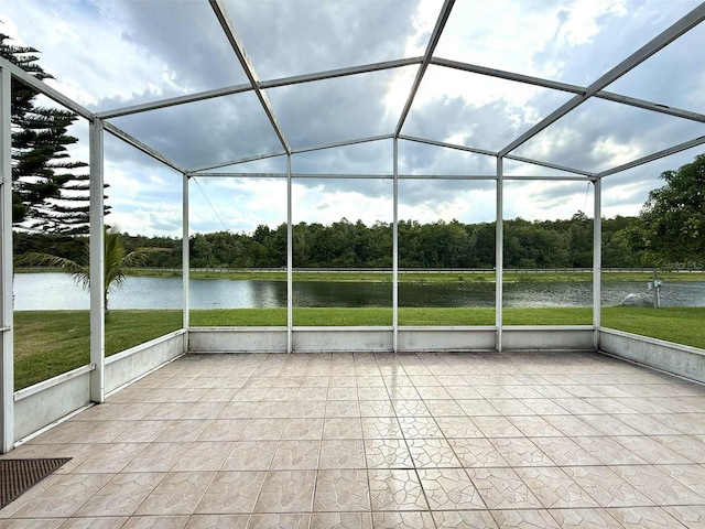 3539 Maple Ridge Loop, Kissimmee, FL 34741 - unfurnished sunroom with a water view, plenty of natural light, and view of scattered trees