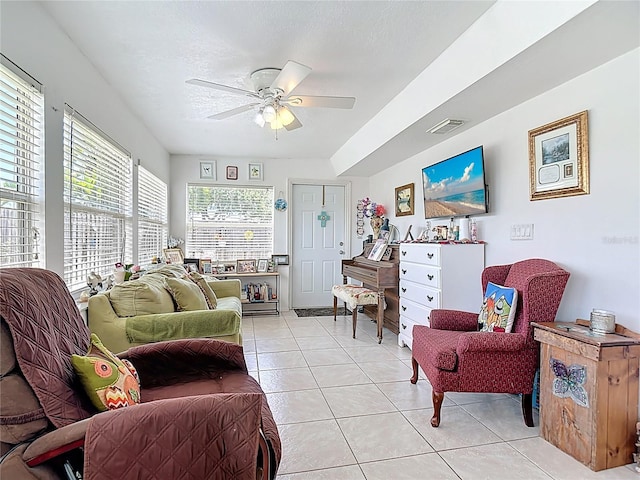 1475 Mars St, Merritt Island, FL 32953 - living area with a ceiling fan and light tile patterned floors