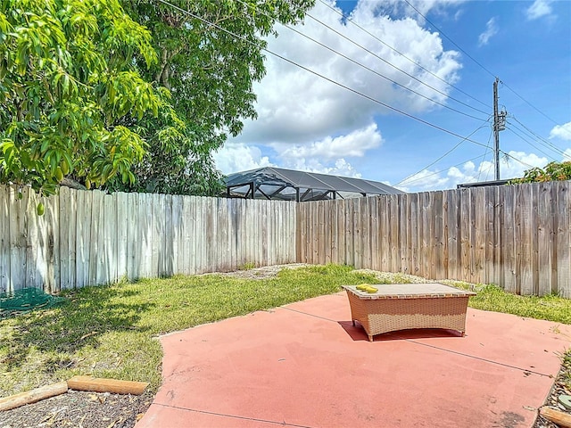 1475 Mars St, Merritt Island, FL 32953 - fenced backyard featuring a patio area