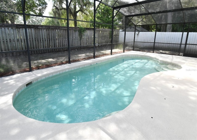 2131 Kaylas Ct, Orlando, FL 32817 - view of swimming pool with a fenced backyard, a patio, and a storage shed