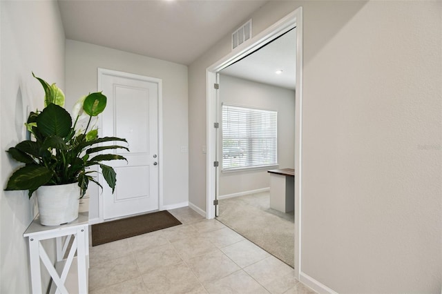 2056 Airedale Way, Lake Alfred, FL 33850 - entryway with baseboards and tile patterned floors