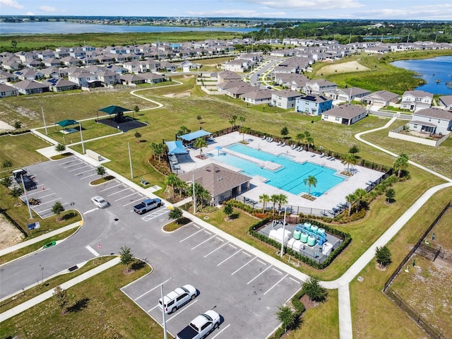 2056 Airedale Way, Lake Alfred, FL 33850 - aerial perspective of suburban area with a pool and a nearby body of water