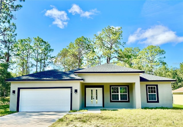 2176 W Galaxy Ln, Citrus Springs, FL 34434 - view of front of property featuring french doors, an attached garage, driveway, stucco siding, and roof with shingles
