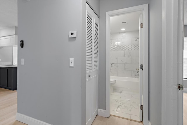 1066 Swanson Dr, Deltona, FL 32738 - corridor with light marble finish flooring and baseboards