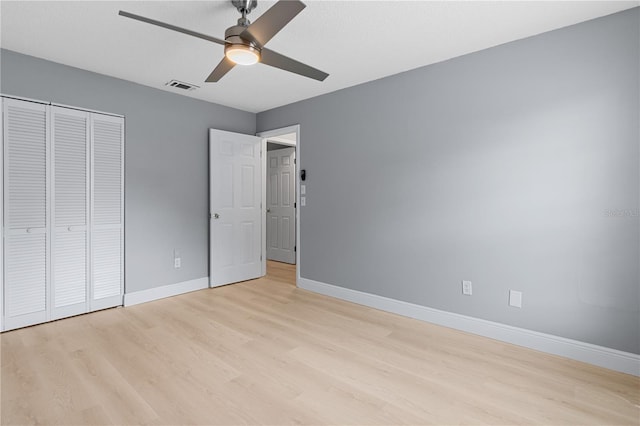 1066 Swanson Dr, Deltona, FL 32738 - unfurnished bedroom featuring light wood-type flooring, a closet, and a ceiling fan