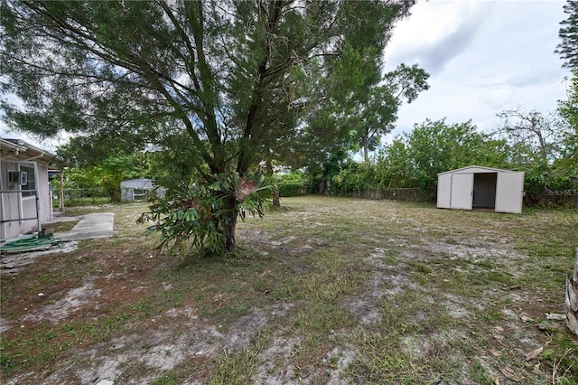 535 Romano Ave, Orlando, FL 32807 - view of yard with a storage unit