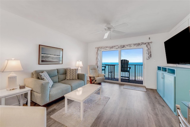 2700 Ocean Shore Blvd Unit 515, Ormond Beach, FL 32176 - living area featuring wood finished floors and ceiling fan