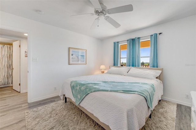 2700 Ocean Shore Blvd Unit 515, Ormond Beach, FL 32176 - bedroom with wood finished floors and a ceiling fan