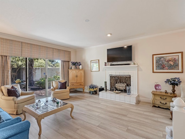 235 S Shadowbay Blvd, Longwood, FL 32779 - living room featuring crown molding, light wood-type flooring, and a fireplace