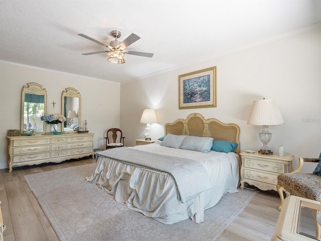 235 S Shadowbay Blvd, Longwood, FL 32779 - bedroom featuring wood finished floors, crown molding, and a ceiling fan
