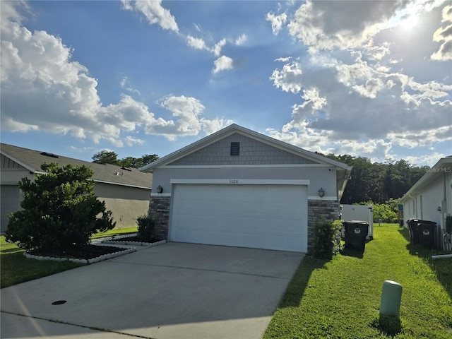 3028 Lakes Crest Ave, Saint Cloud, FL 34772 - view of front of property featuring stone siding, a front yard, and driveway