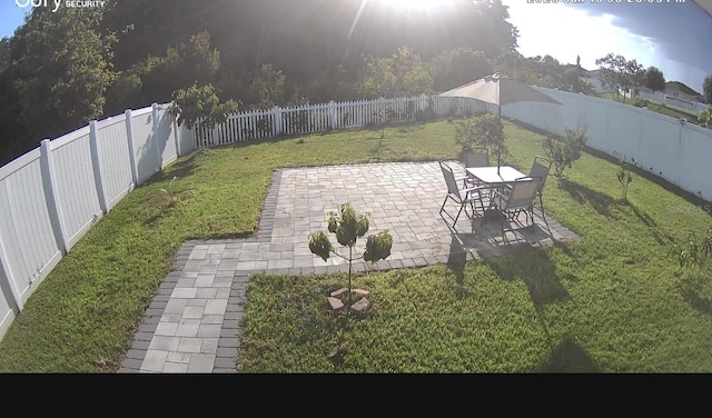 3028 Lakes Crest Ave, Saint Cloud, FL 34772 - fenced backyard with a patio area