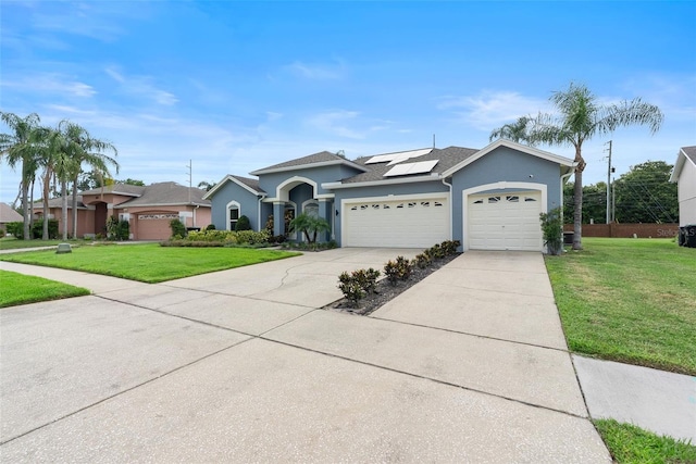 4110 Maplegrove Dr, Orlando, FL 32818 - single story home with an attached garage, a front yard, solar panels, stucco siding, and concrete driveway