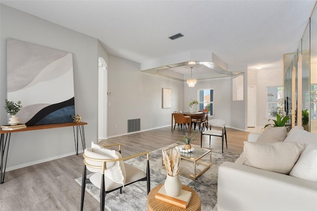 4110 Maplegrove Dr, Orlando, FL 32818 - living room featuring wood finished floors and baseboards