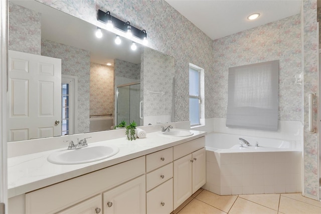 4110 Maplegrove Dr, Orlando, FL 32818 - full bath with tile patterned floors, double vanity, a garden tub, a stall shower, and wallpapered walls