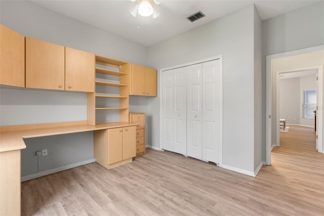 4110 Maplegrove Dr, Orlando, FL 32818 - unfurnished office featuring built in study area, light wood-style flooring, and a ceiling fan